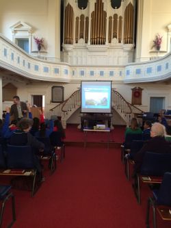 Peter taking questions from the children